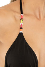 Top con detalles